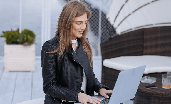 A professional woman working on a laptop, representing Canandaigua’s expert translation services tailored for businesses A professional woman working on a laptop, representing Canandaigua’s expert translation services tailored for businesses
