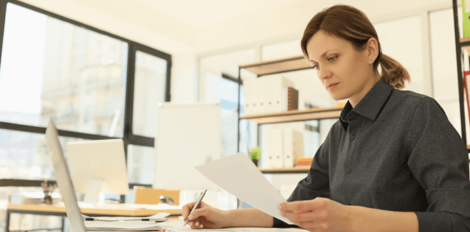 A document translator working on official documents to provide certified translation services in New York. A document translator working on official documents to provide certified translation services in New York.