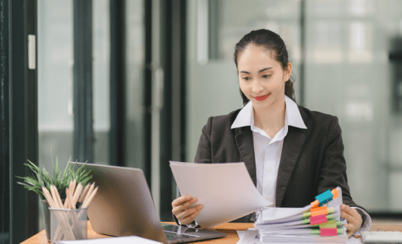 Translator working on official paperwork using certified translation in New York to deliver fast and reliable translations.