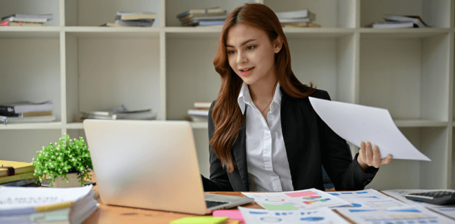 Human translator working on immigration paperwork using certified translation services in New York for legal accuracy.