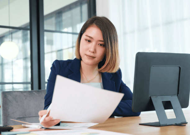 A translator works on translating documents in New York, ensuring accuracy & timely delivery for business and personal needs.